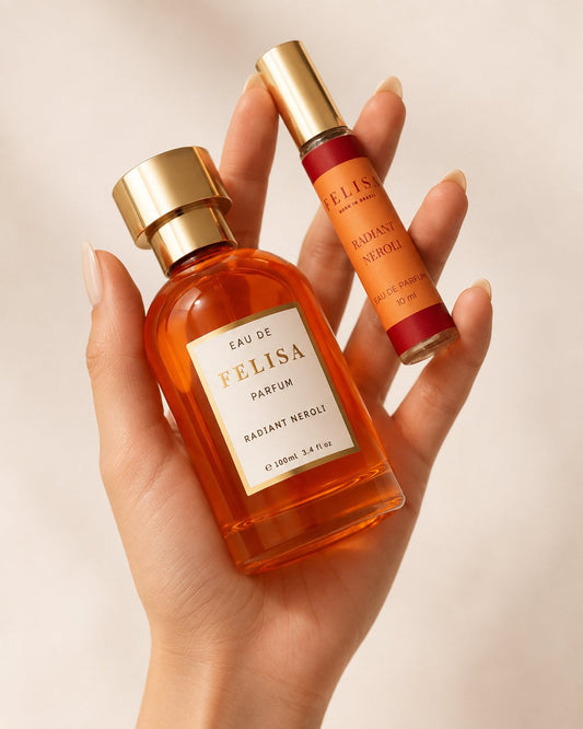 frascos miniatura 10ml e 100ml lado a lado, em composição ambientada - perfume Radiant Neroli, Felisa Beauty, perfumaria de nicho brasileira de luxo