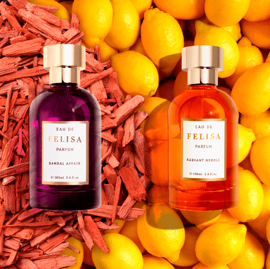 Frascos de Sandal Affair e Radiant Neroli sobre composição de madeira e cítricos